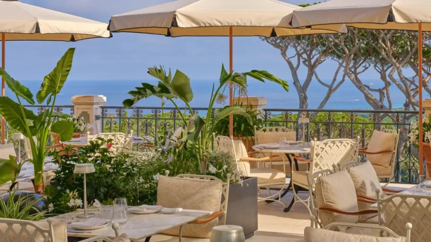 Outdoor dining at Matsuhisa Saint-Tropez with sea views and elegant seating.